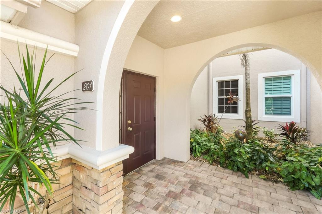 8771 Coastline Court, Unit 201 Naples, FL 34120 - Photo 6 of 49 a view of a entryway