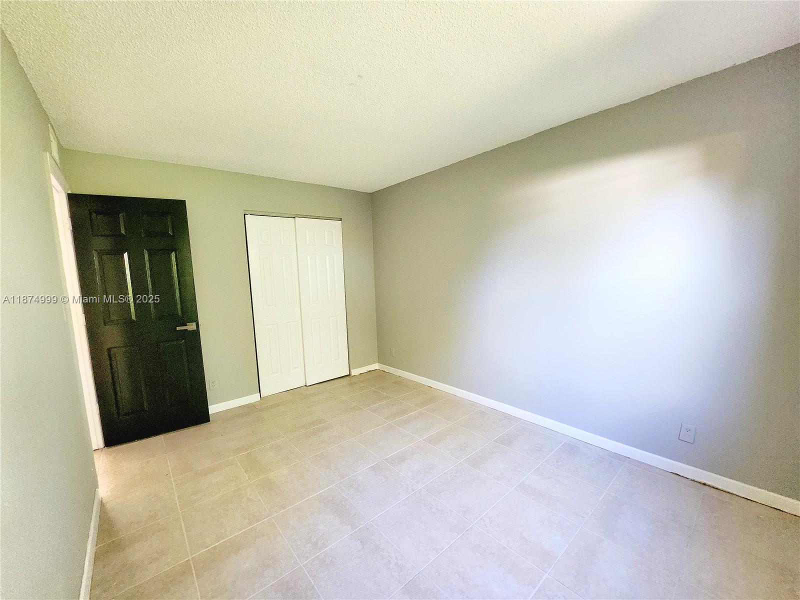 191 Southwest 15th Street, Unit 201 Pompano Beach, FL 33060 - Photo 9 of 10 a view of empty room