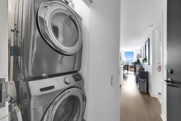 a view of a kitchen with washer and dryer