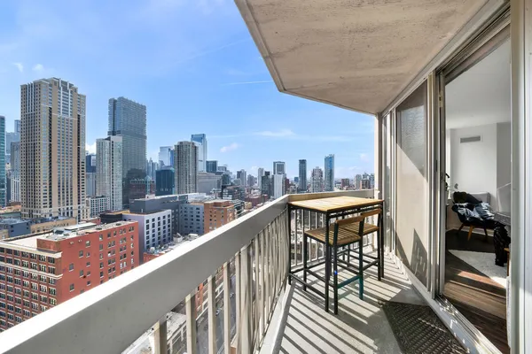 a balcony with a city view
