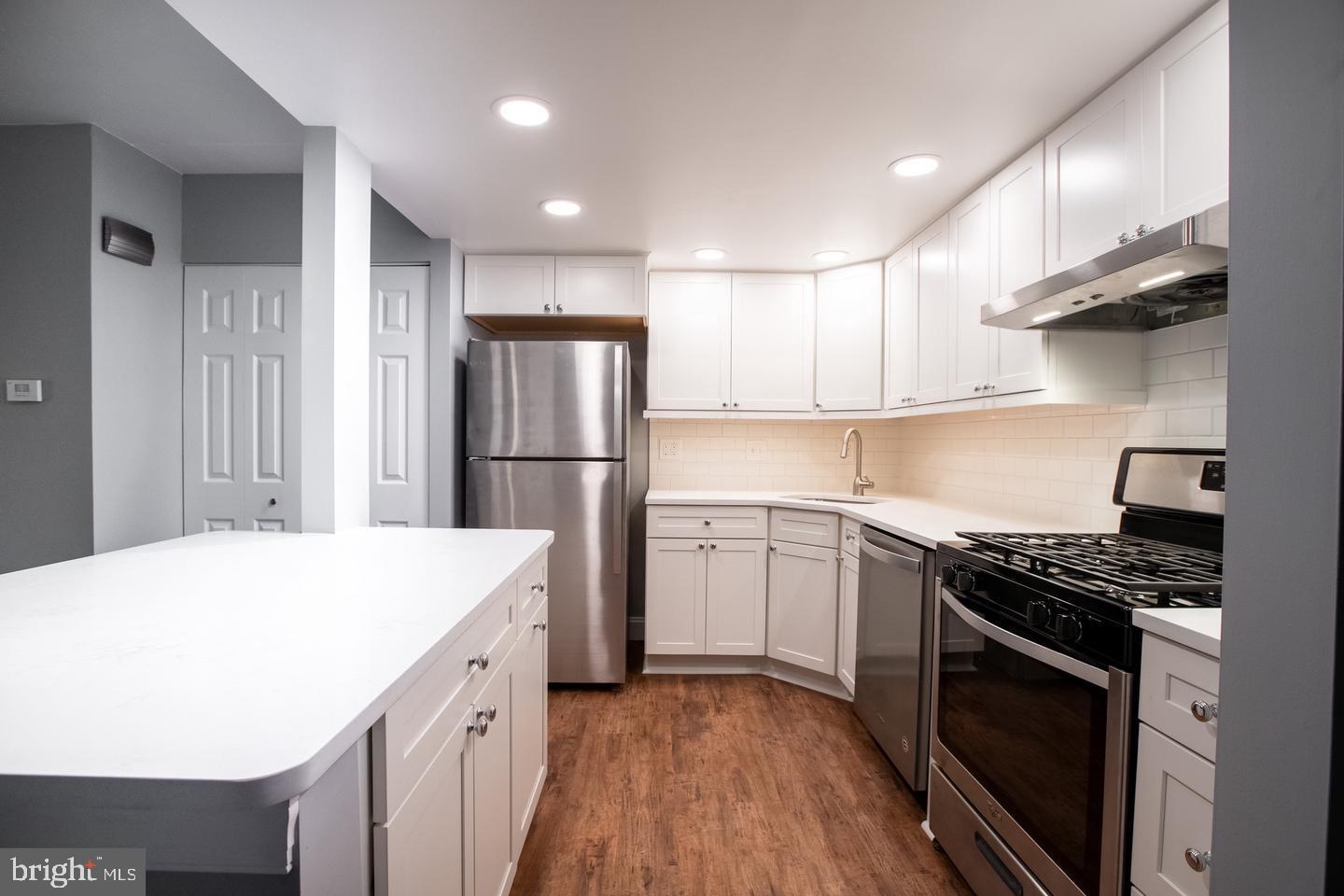 188 Old Forge Crossing, Unit 188 Devon, PA 19333 - Photo 1 of 19 a kitchen with stainless steel appliances a refrigerator sink and stove