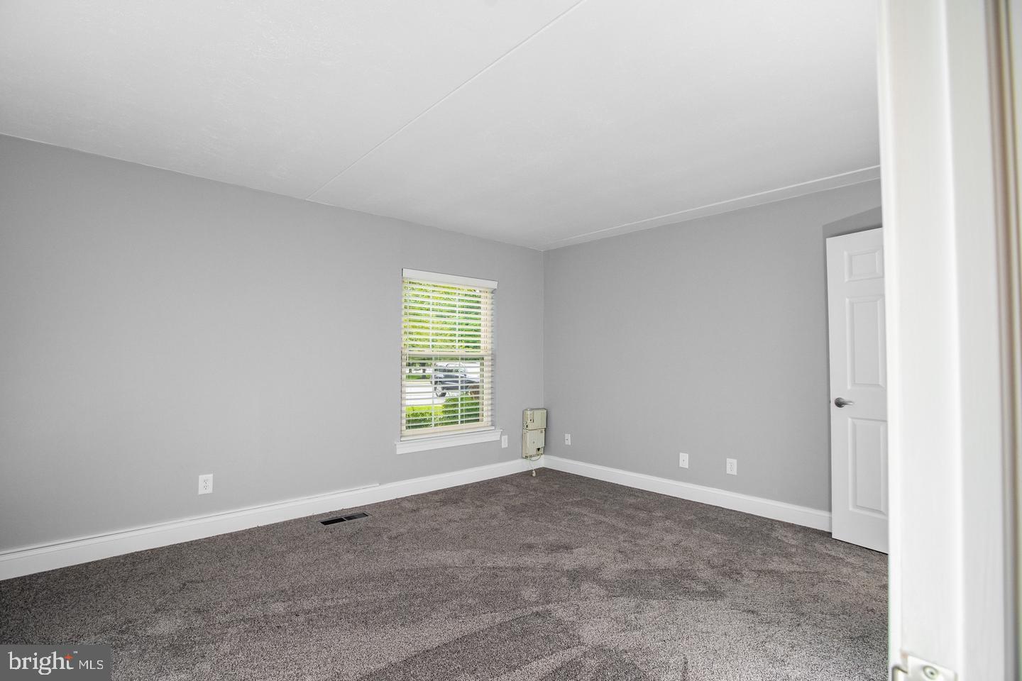 188 Old Forge Crossing, Unit 188 Devon, PA 19333 - Photo 12 of 19 an empty room with a window