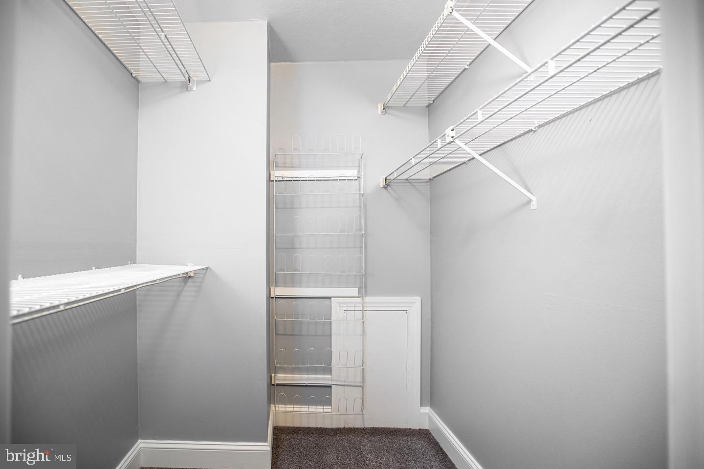 188 Old Forge Crossing, Unit 188 Devon, PA 19333 - Photo 13 of 19 a view of walk in closet with empty racks