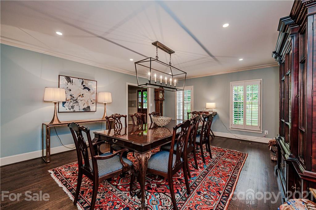 3800 River Ridge Road Charlotte, NC 28226 - Photo 15 of 48 a view of a dining room with furniture window and wooden floor