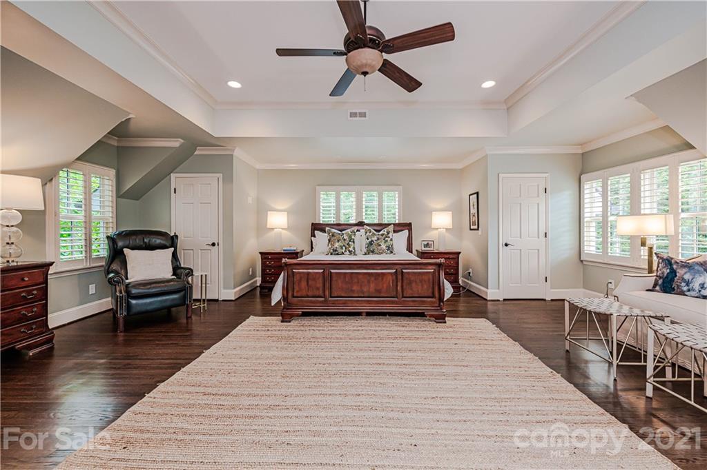 3800 River Ridge Road Charlotte, NC 28226 - Photo 18 of 48 a bedroom with a bed and wooden floor