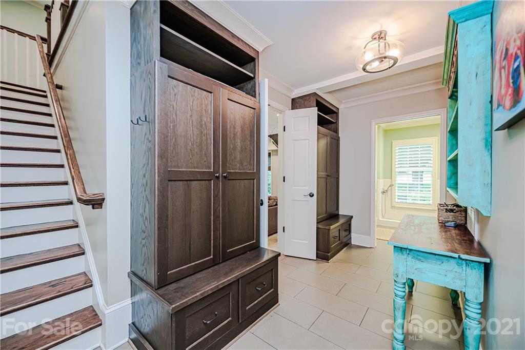 3800 River Ridge Road Charlotte, NC 28226 - Photo 24 of 48 a view of a hallway with wooden floor and staircase