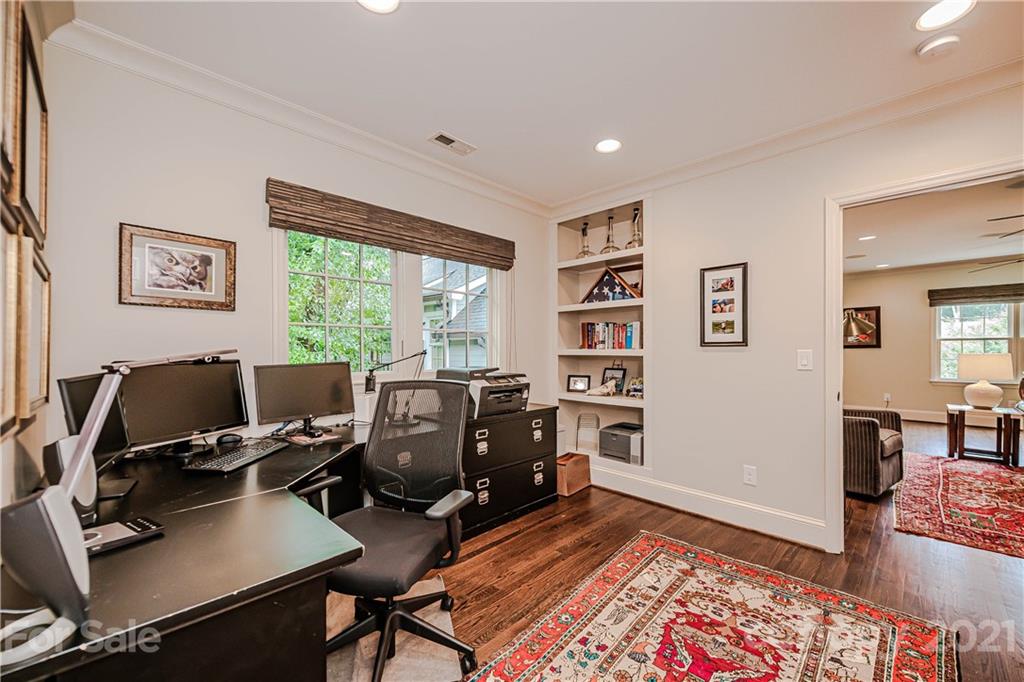 3800 River Ridge Road Charlotte, NC 28226 - Photo 32 of 48 a view of a workspace with furniture and a window
