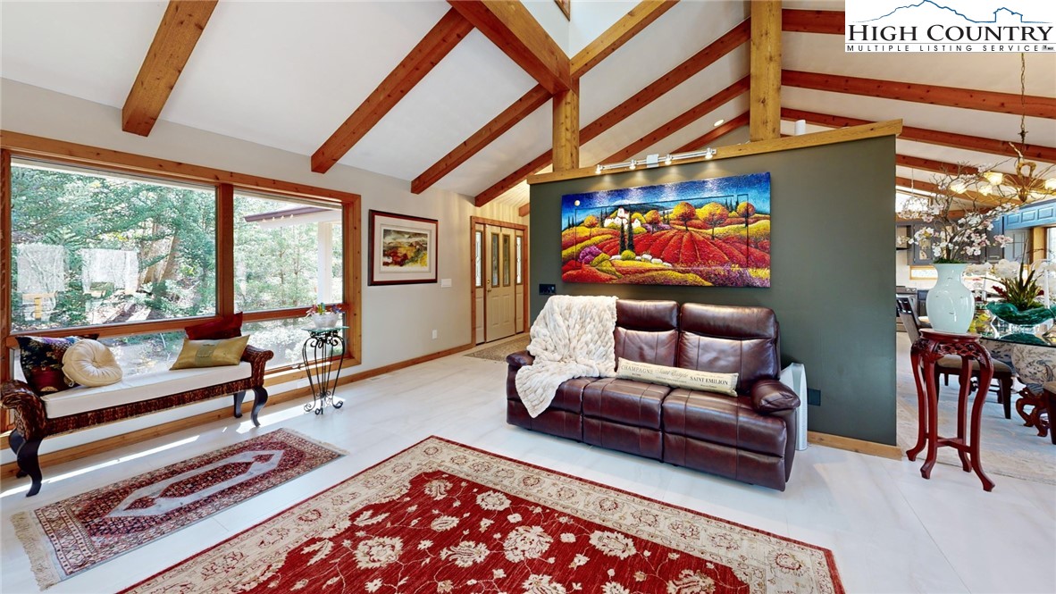 505 Tanglewood Cemetery Road Linville, NC 28646 - Photo 11 of 47 a outdoor living space with furniture and a potted plant