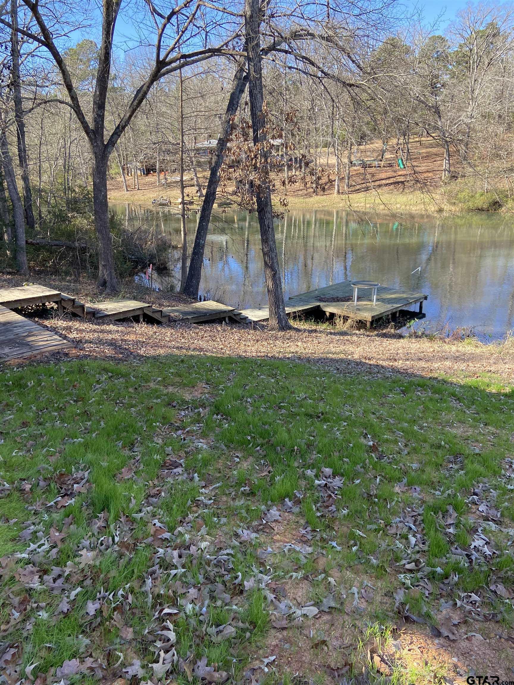 58 Florey Lake Road Kilgore, TX 75662 - Photo 3 of 14 a view of a garden with a slide
