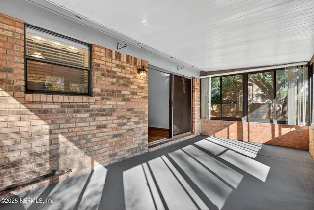 a picture of a bathroom with a shower