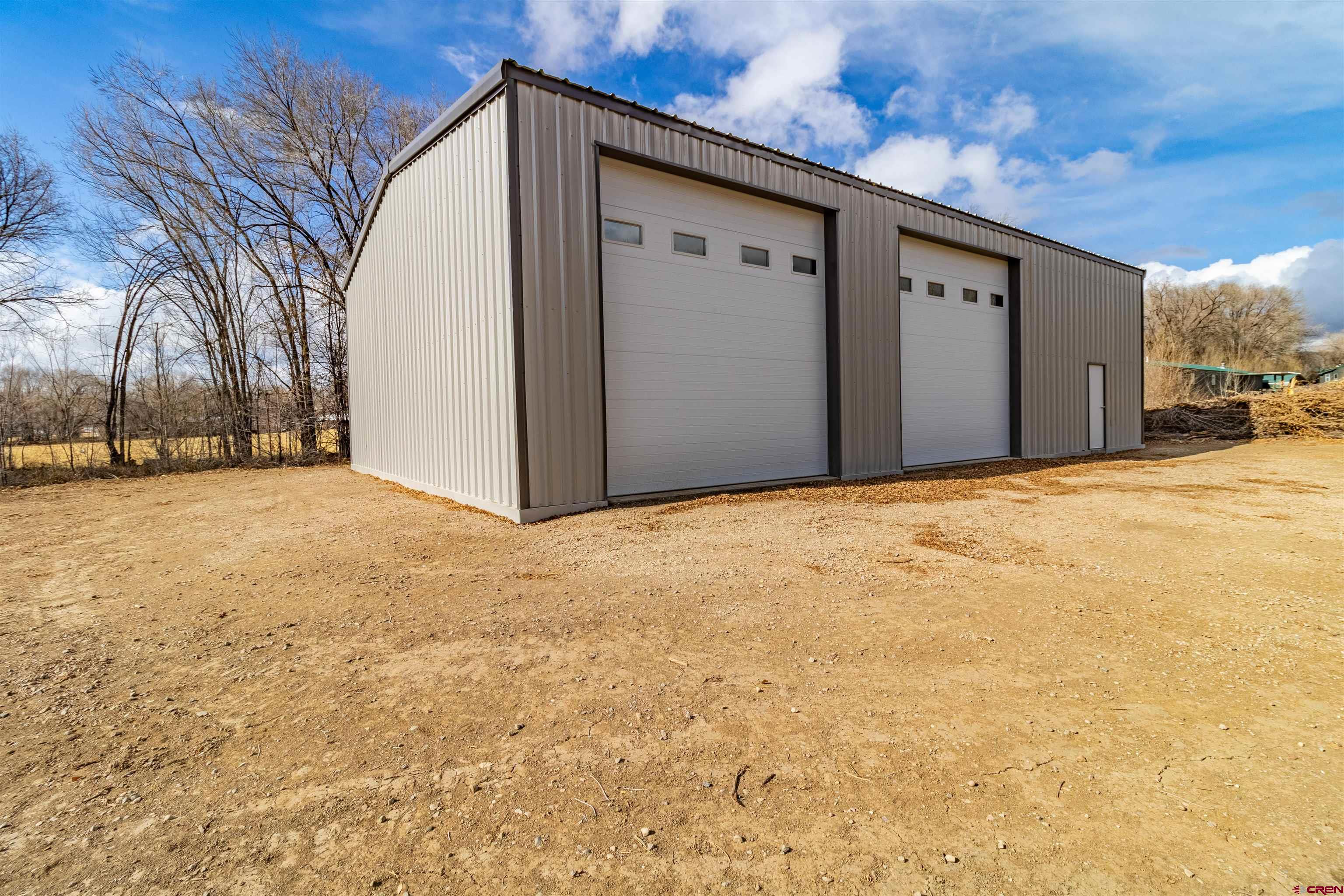 31 Road 3235 Aztec, NM 87410 - Photo 3 of 9 a view of a house with a snow in the yard