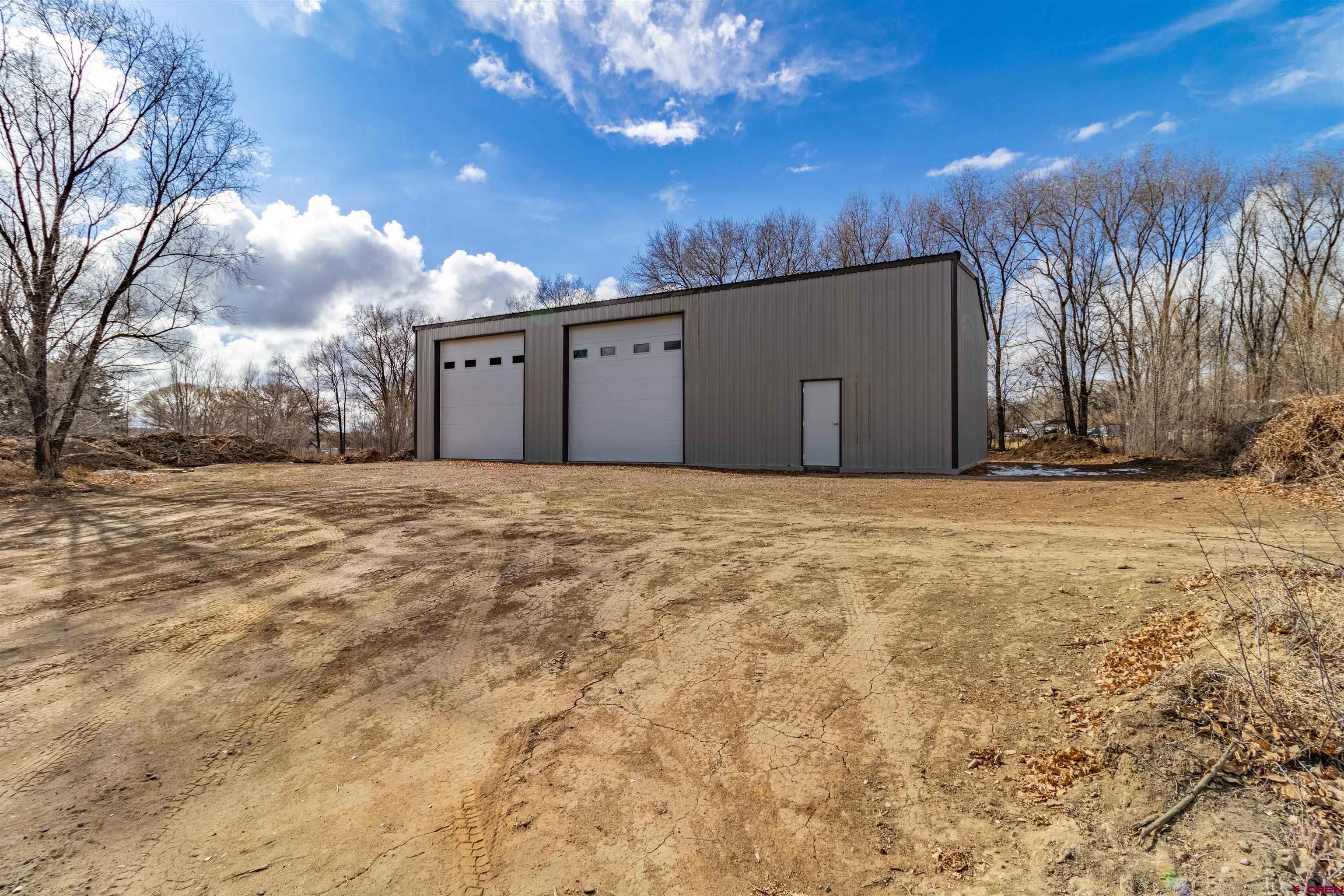 31 Road 3235 Aztec, NM 87410 - Photo 4 of 9 a view of a house with a snow in front of yard