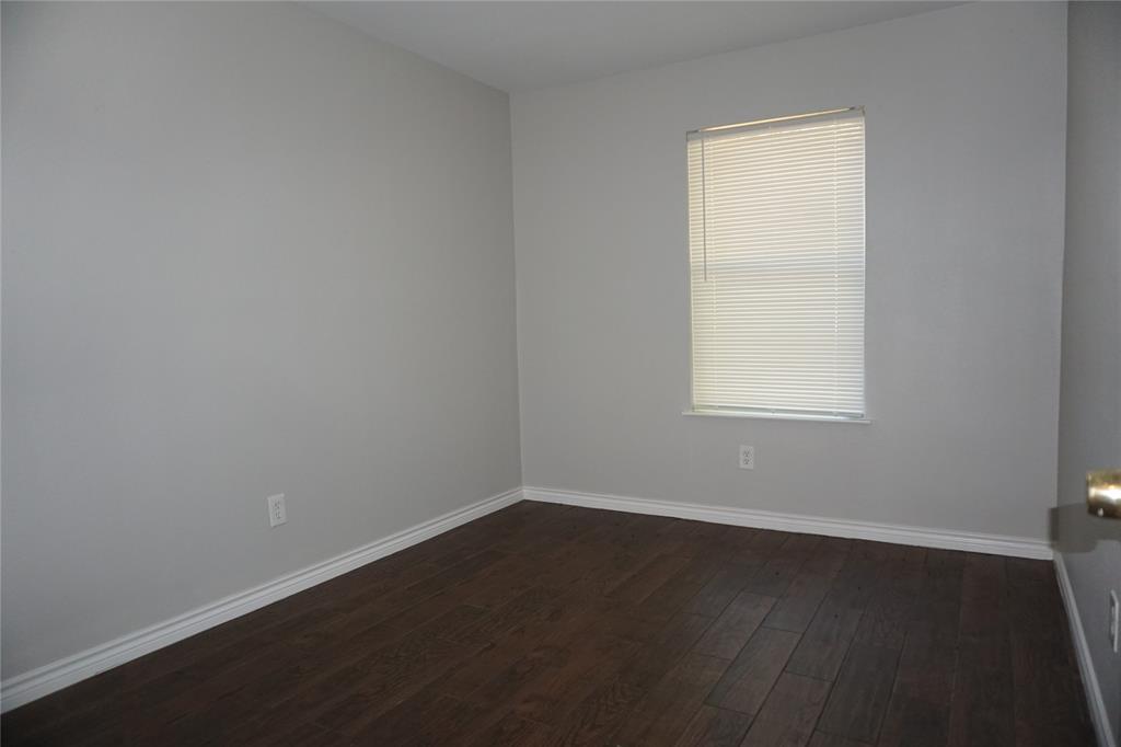 2113 R. W. Bivens Lane, Unit 2115 Fort Worth, TX 76105 - Photo 8 of 9 an empty room with a window
