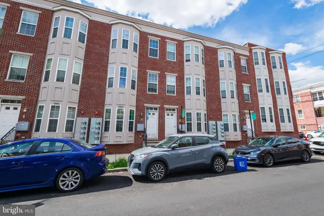 a car parked in front of a building