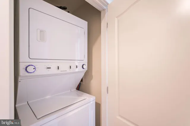 a view of a bathroom with a sink and mirror