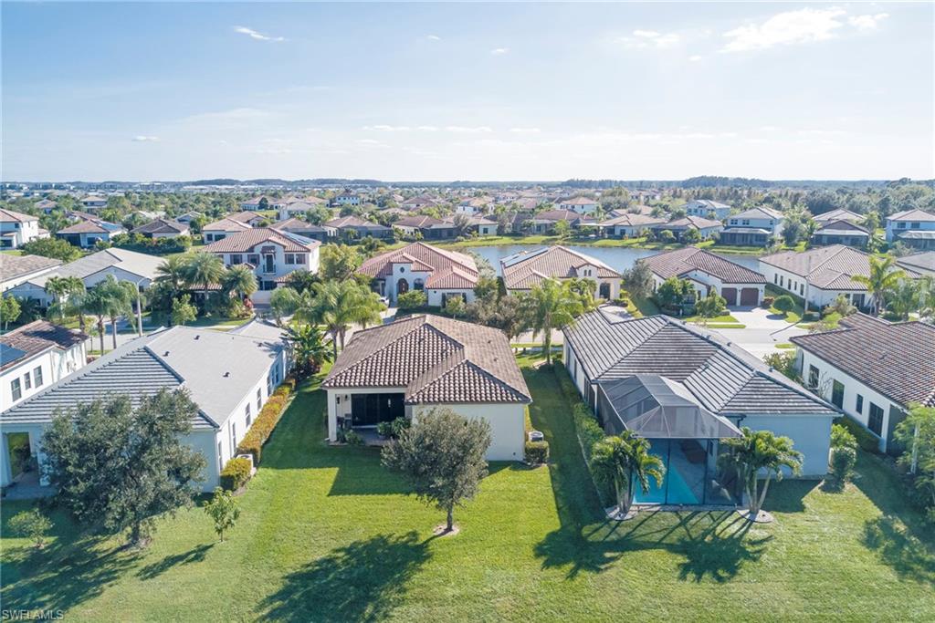 5239 Ferrari Avenue Ave Maria, FL 34142 - Photo 26 of 30 an aerial view of a house