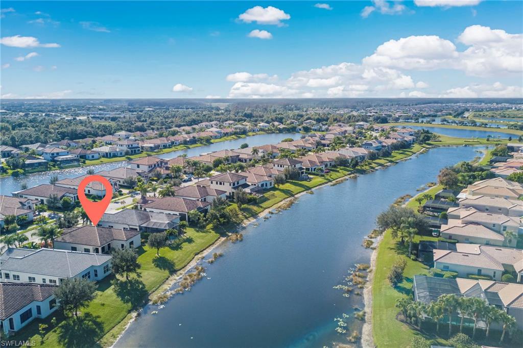 5239 Ferrari Avenue Ave Maria, FL 34142 - Photo 28 of 30 an aerial view of a city