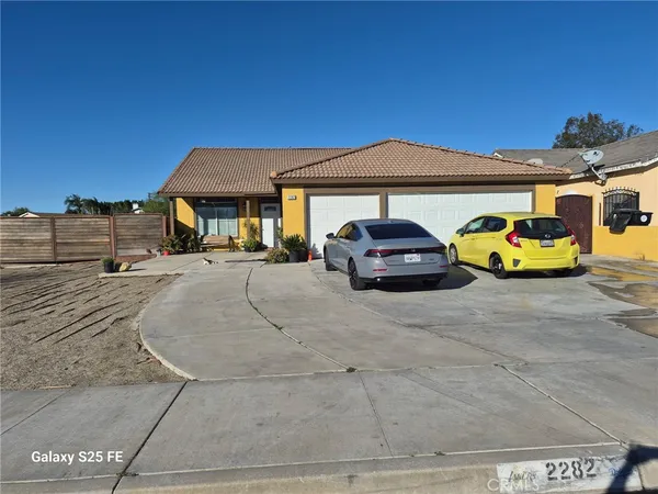 a car parked in front of garage