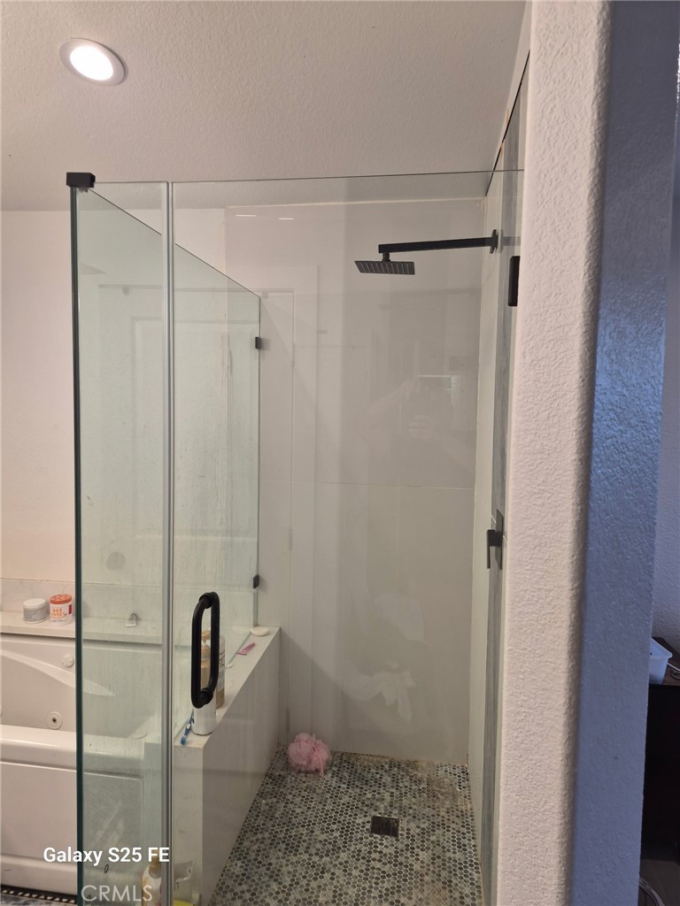 2282 North Smoketree Avenue Rialto, CA 92377 - Photo 12 of 15 a bathroom with a shower and a shower