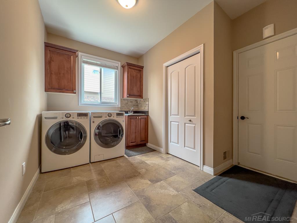 16070 Moore Park Road Macomb, MI 48044 - Photo 26 of 76 LG appliances included. Plenty of storage in cabinets and in double closet that extends the length of the room (single closet door).