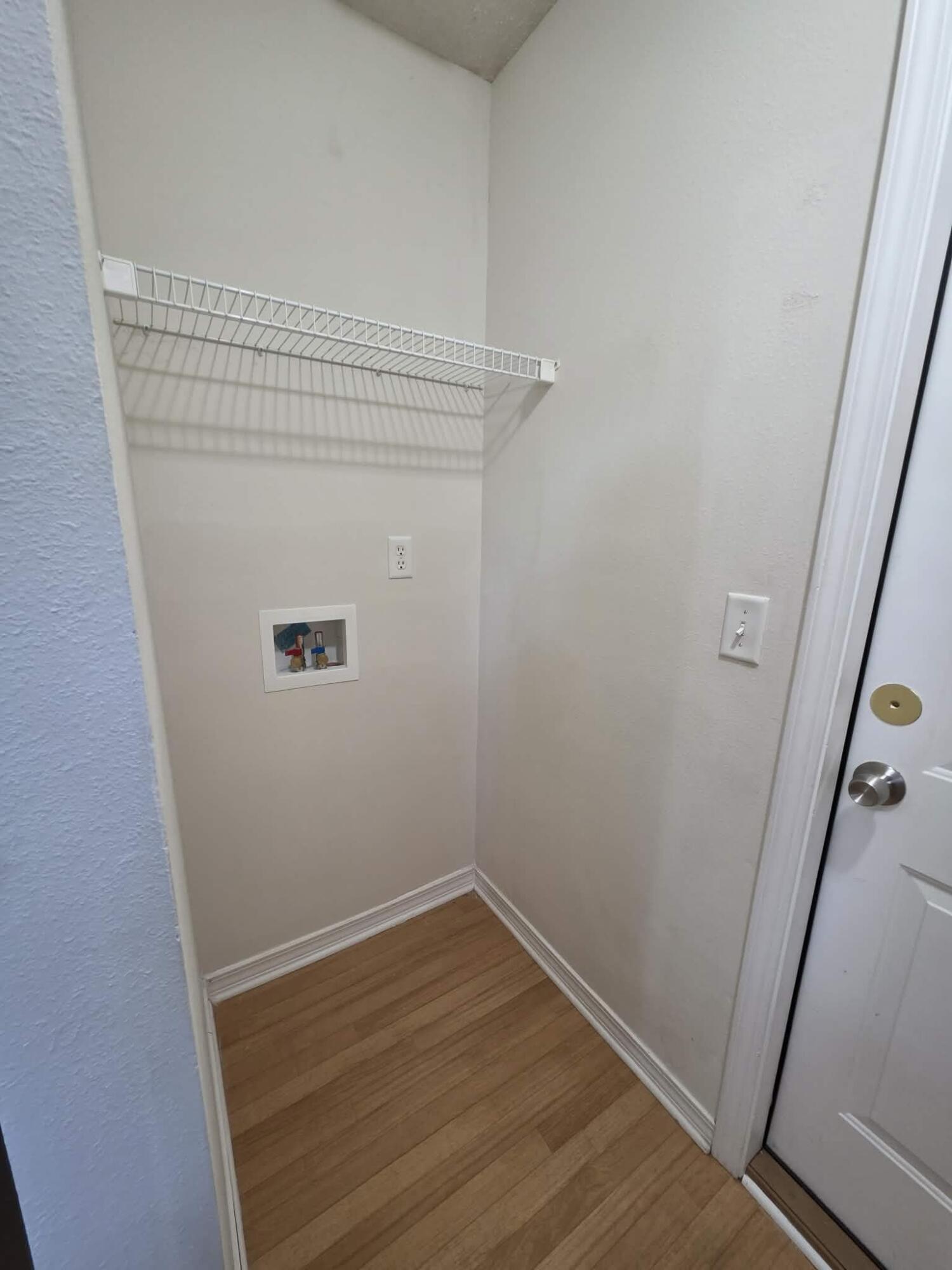 8347 Tavira Street Navarre, FL 32566 - Photo 22 of 49 a view of small space with wooden floor