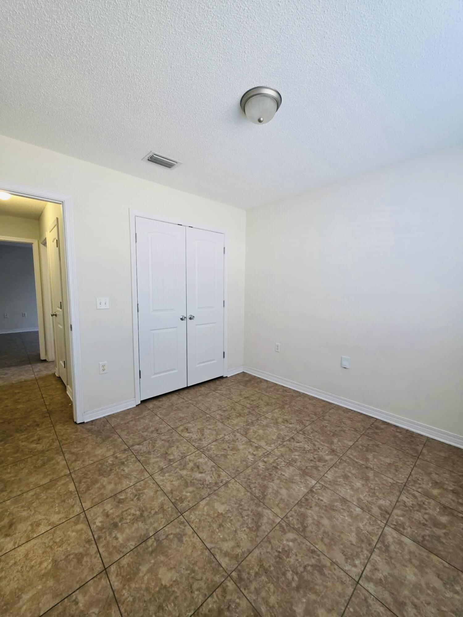 8347 Tavira Street Navarre, FL 32566 - Photo 31 of 49 a view of an empty room