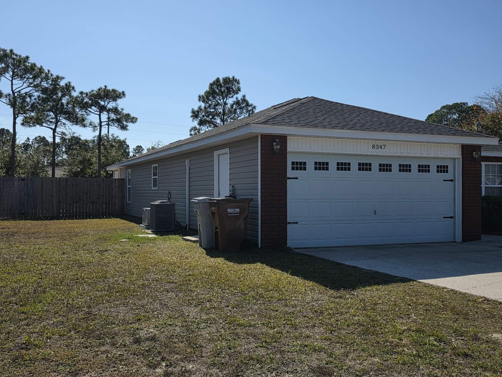 8347 Tavira Street Navarre, FL 32566 - Photo 4 of 49 a backyard of a house