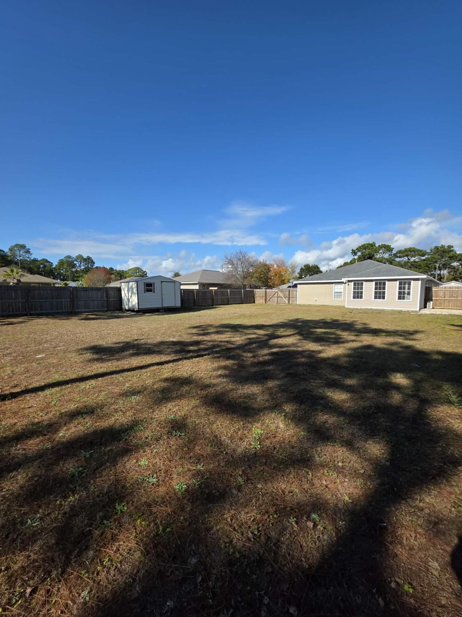 8347 Tavira Street Navarre, FL 32566 - Photo 45 of 49 a view of an ocean and city