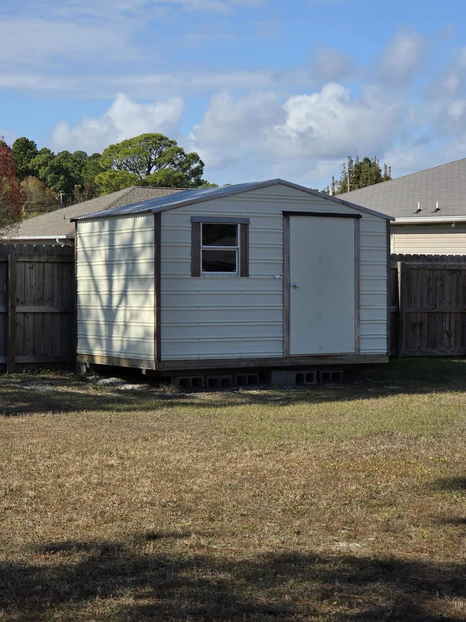 8347 Tavira Street Navarre, FL 32566 - Photo 46 of 49 a view of a house with a yard from a floor