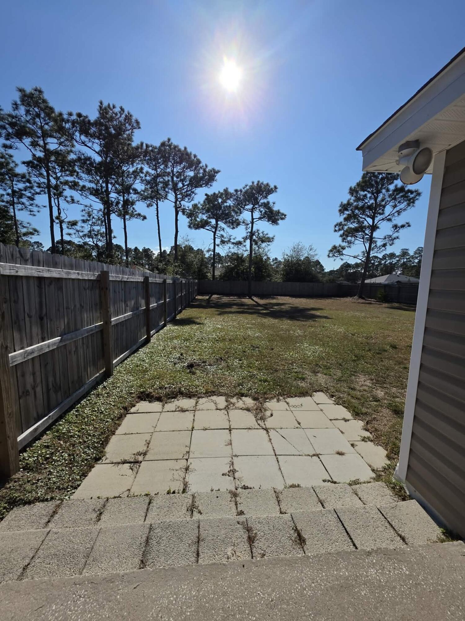 8347 Tavira Street Navarre, FL 32566 - Photo 48 of 49 a view of a terrace with sky view