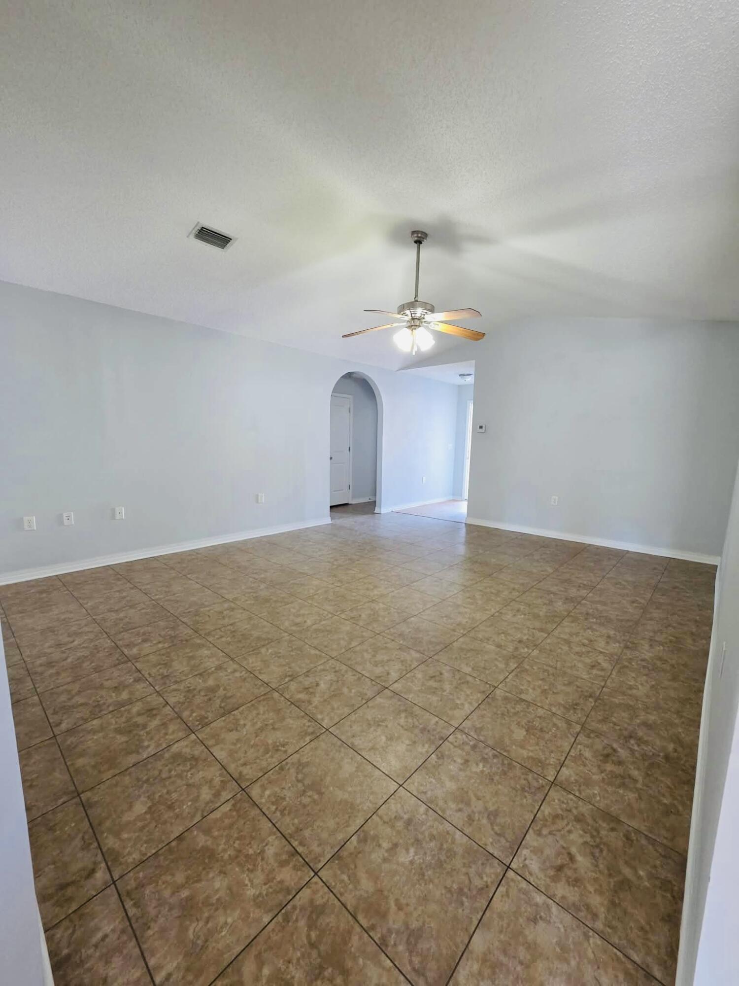 8347 Tavira Street Navarre, FL 32566 - Photo 9 of 49 a view of a kitchen with a sink