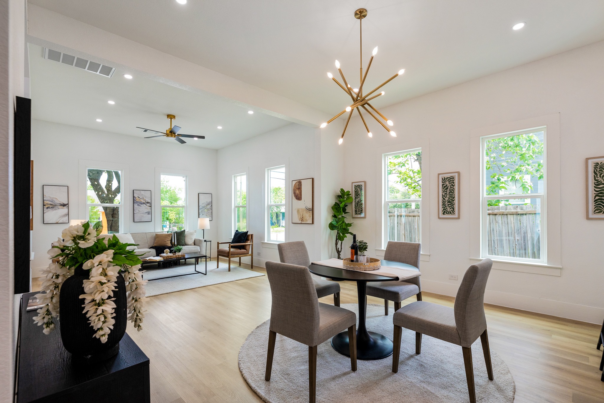 910 West 4th Street Taylor, TX 76574 - Photo 22 of 38 a view of a dining room with furniture window and wooden floor