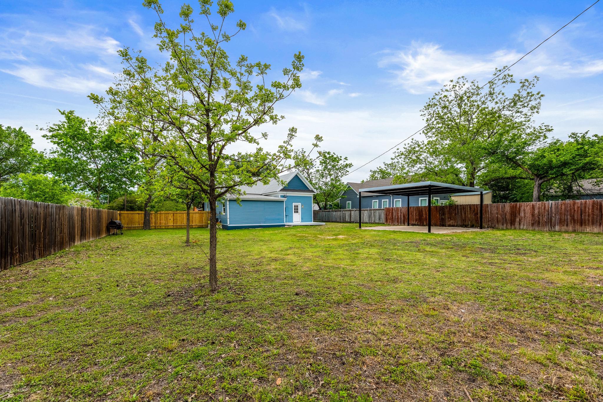 910 West 4th Street Taylor, TX 76574 - Photo 35 of 38 a house view with a garden space