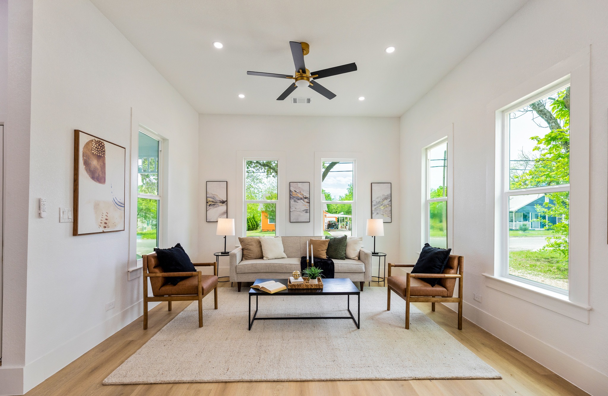 910 West 4th Street Taylor, TX 76574 - Photo 6 of 38 a living room with furniture and a large window