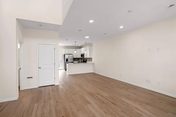 a view of kitchen dining space with wooden floor