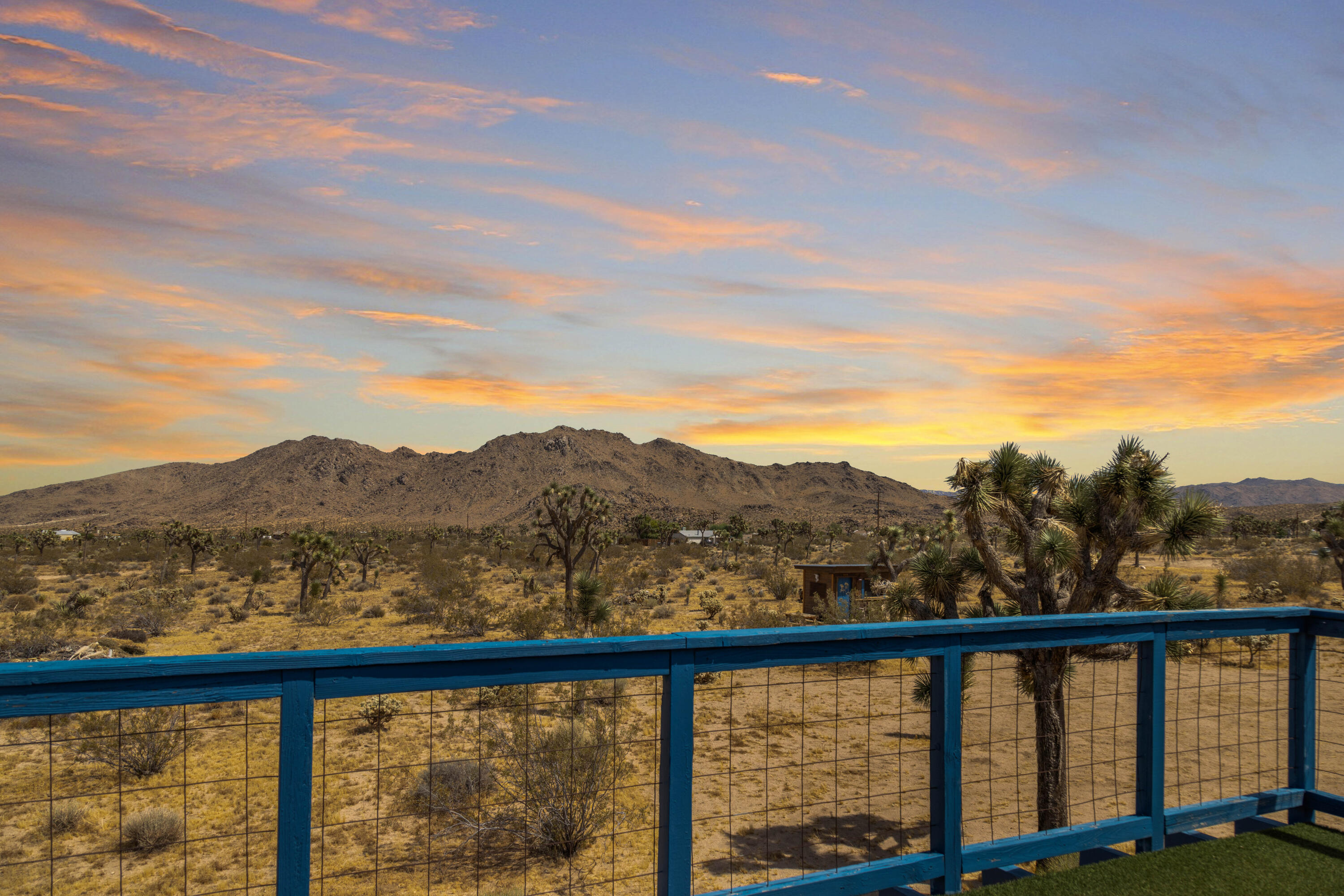 3733 Julcrest Road Yucca Valley, CA 92284 - Photo 3 of 42 a view of a mountain from a balcony