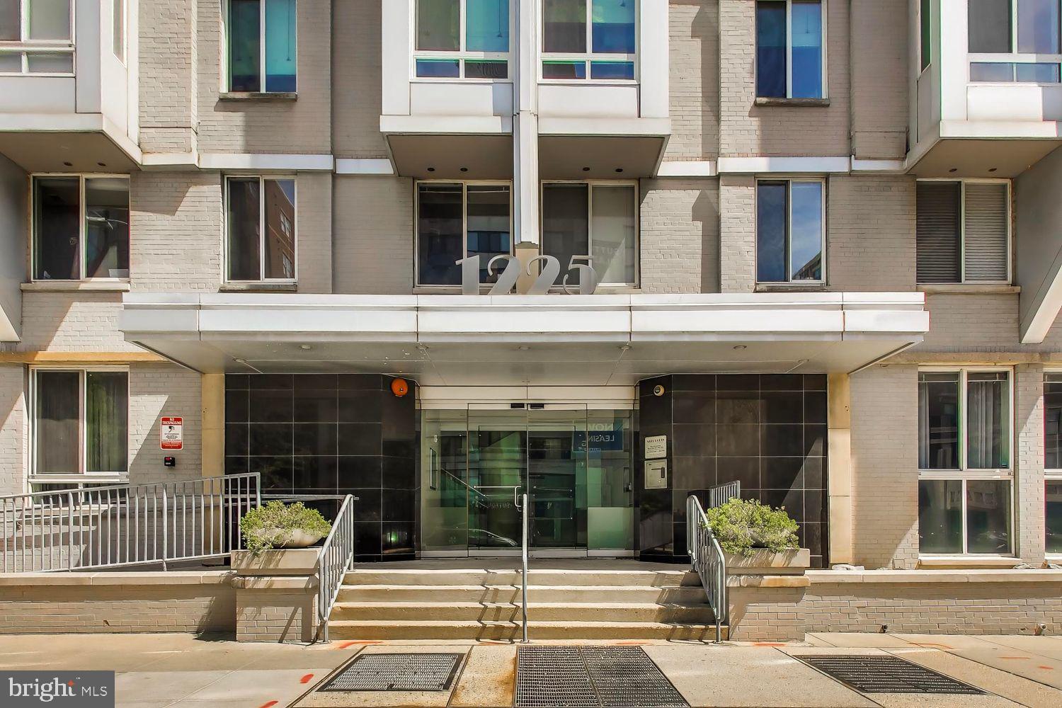 1225 13th Street Northwest, Unit 506 Washington, DC 20005 - Photo 2 of 18 a view of a building with a window and bench