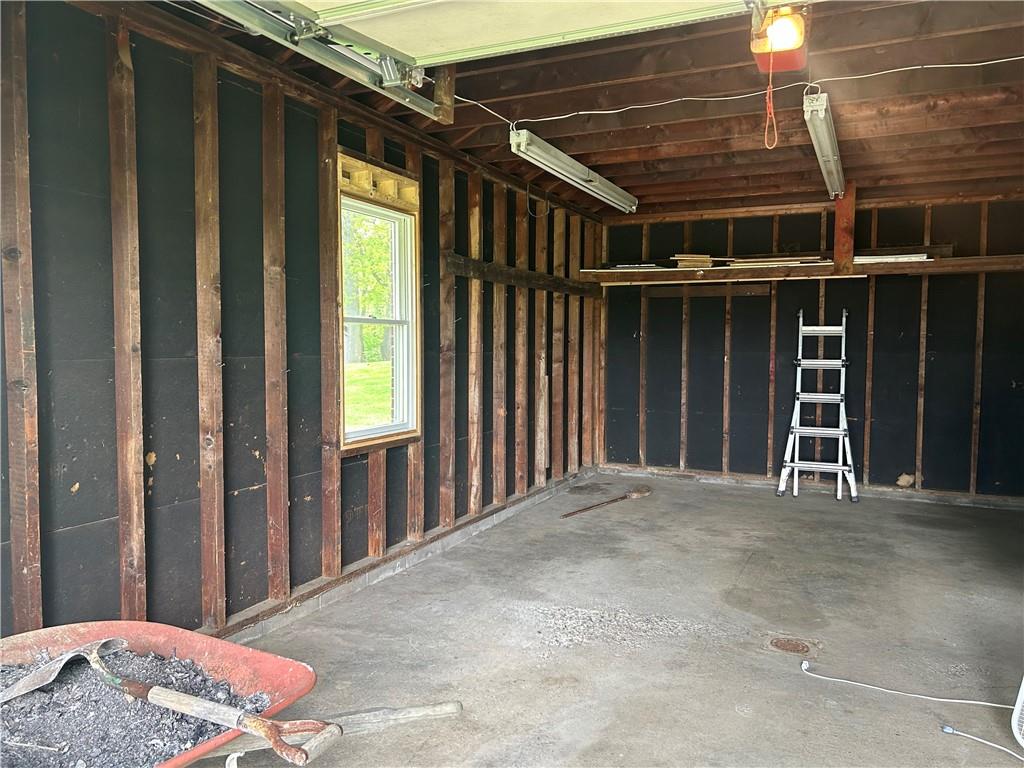 1023 Bonniebrook Road Butler, PA 16002 - Photo 14 of 40 a view of an empty room with wooden floor and a window