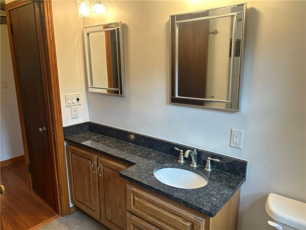 1023 Bonniebrook Road Butler, PA 16002 - Photo 10 of 40 a bathroom with sinks granite countertop a sink and a mirror