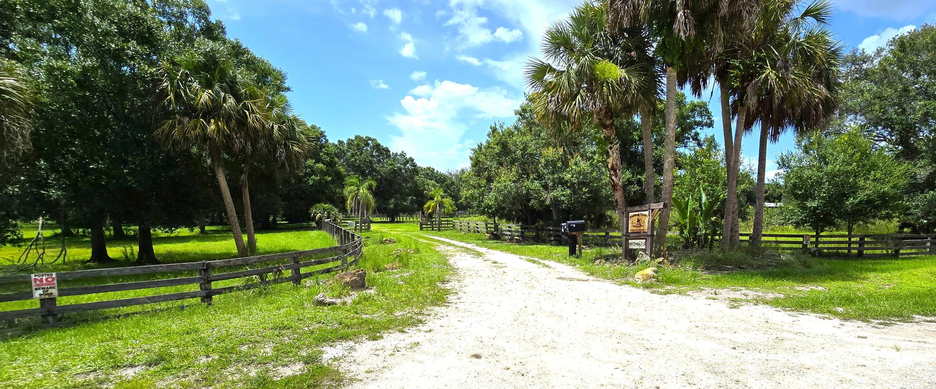 4567 Highway 710 Okeechobee, FL 34974 - Photo 3 of 51 a view of a park with large trees