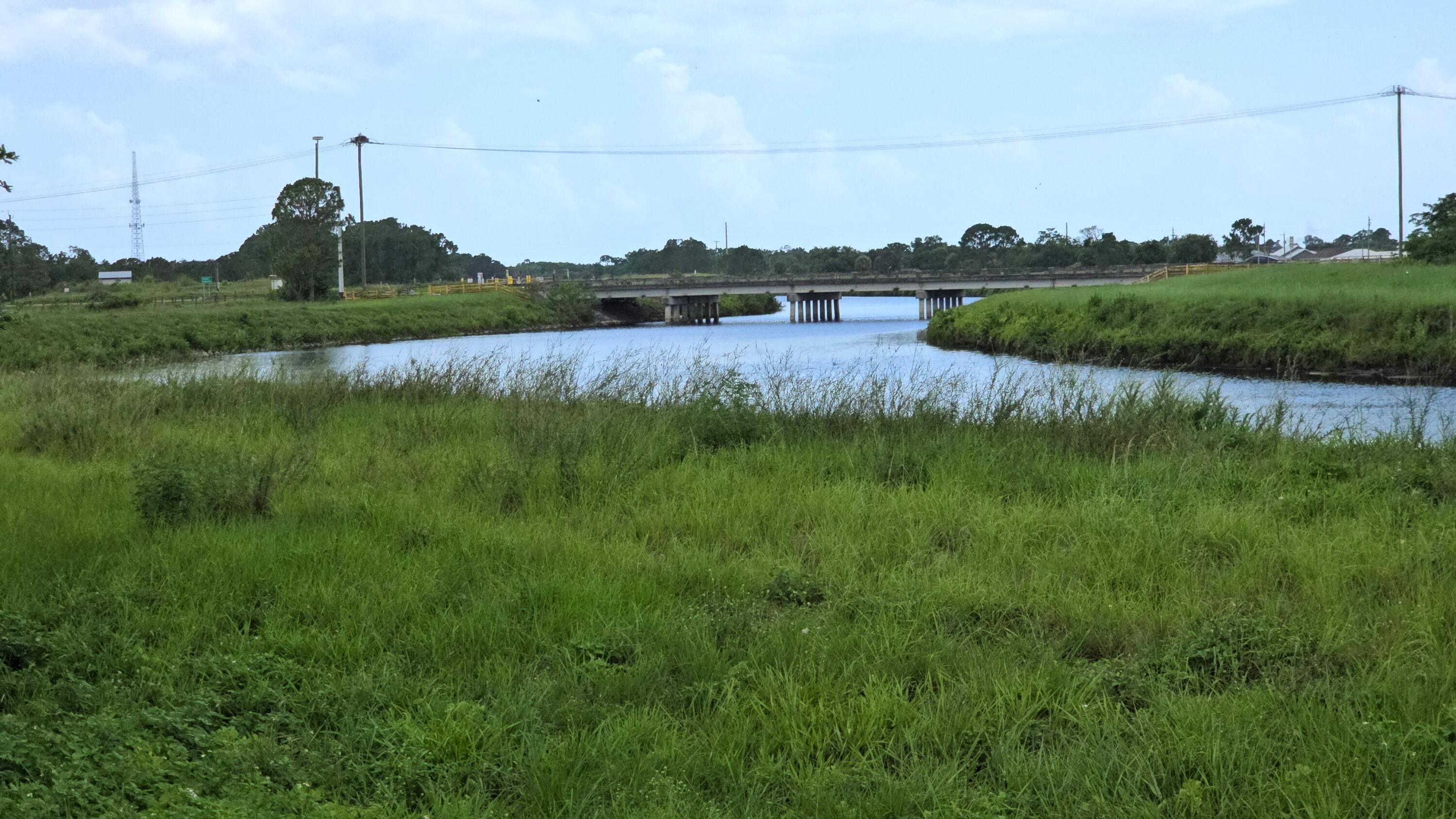 4567 Highway 710 Okeechobee, FL 34974 - Photo 40 of 51 a view of a lake with houses in outdoor space