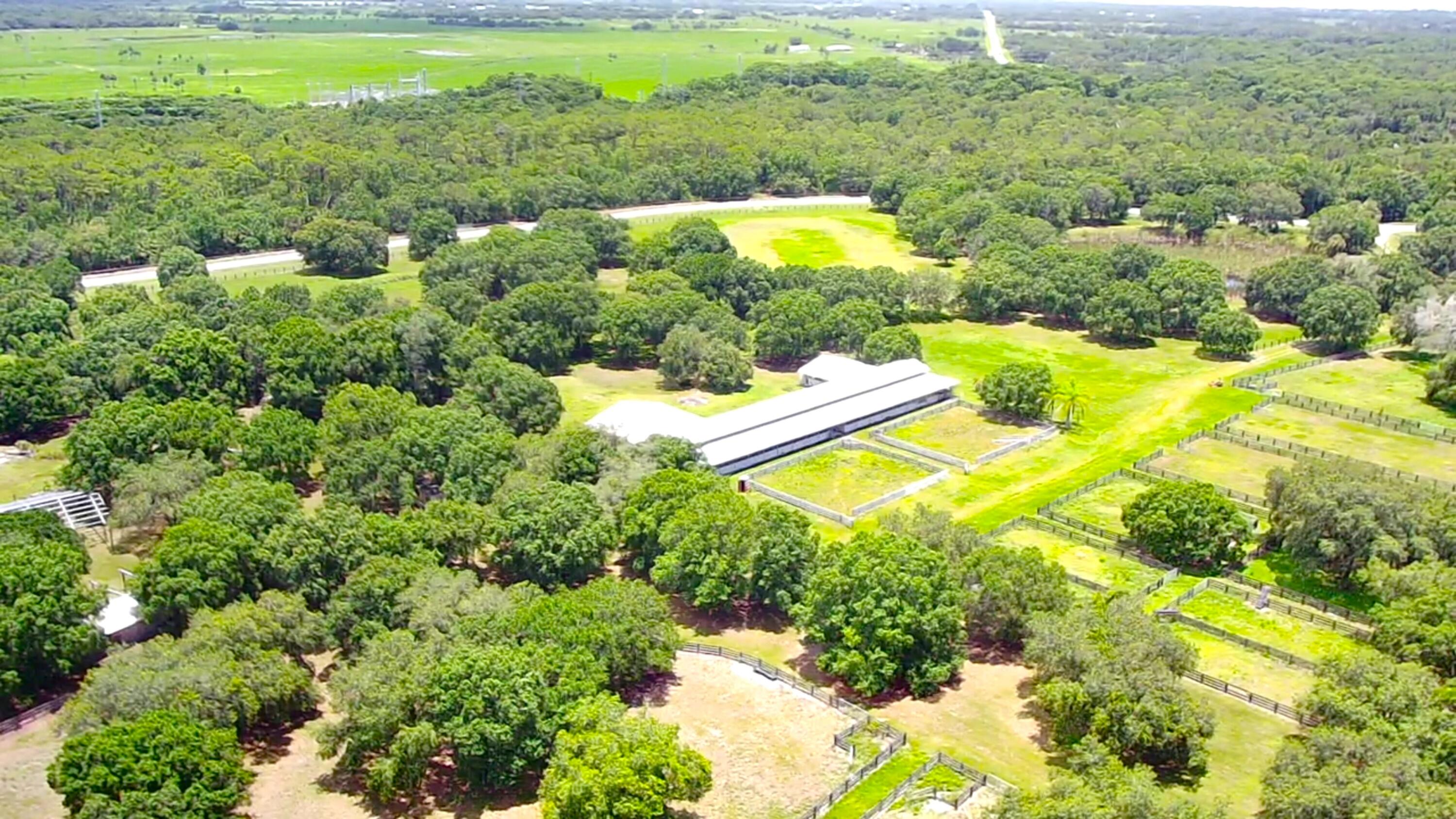 4567 Highway 710 Okeechobee, FL 34974 - Photo 44 of 51 a view of a garden with swimming pool