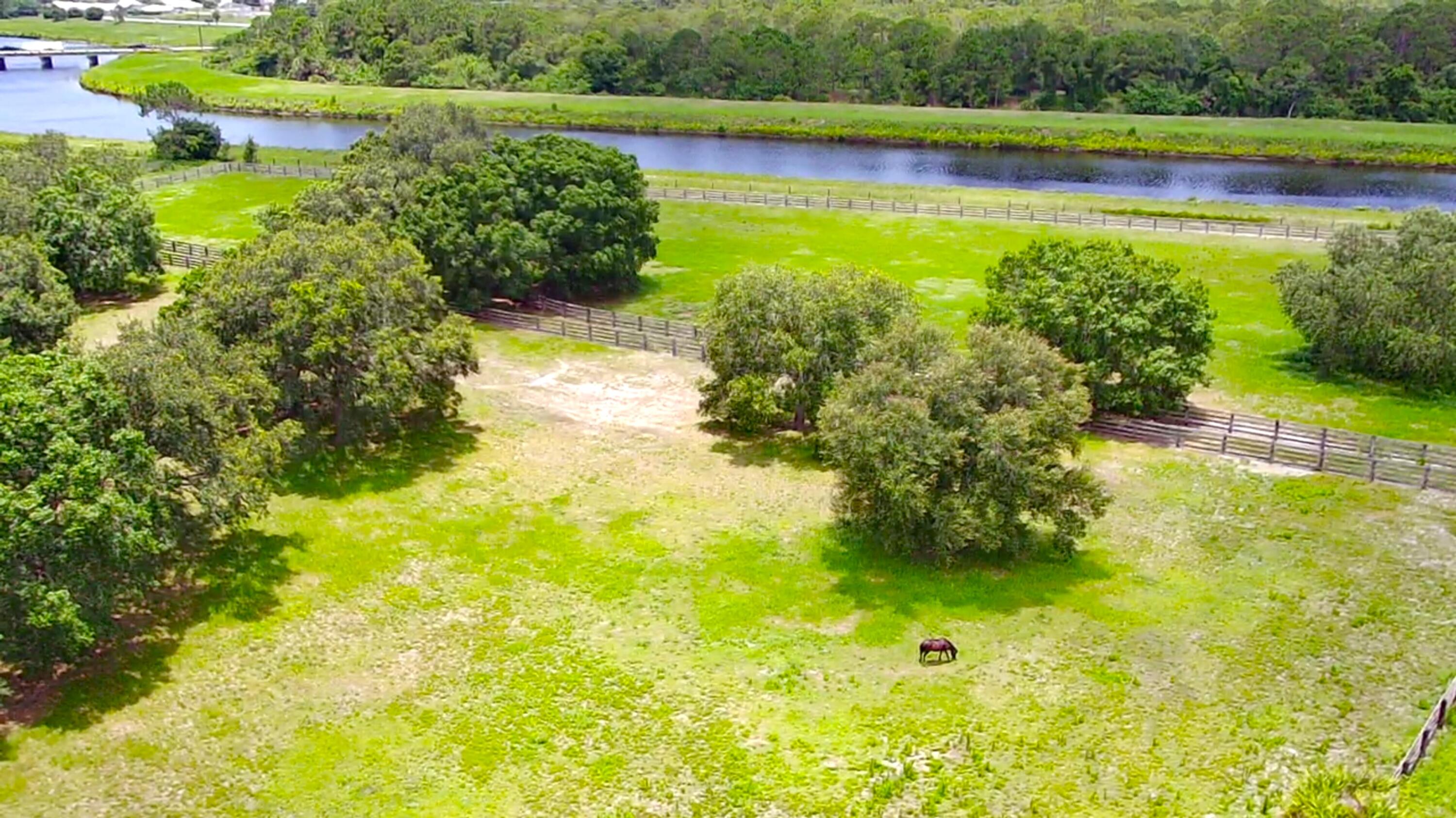 4567 Highway 710 Okeechobee, FL 34974 - Photo 45 of 51 a view of a lake with a big yard
