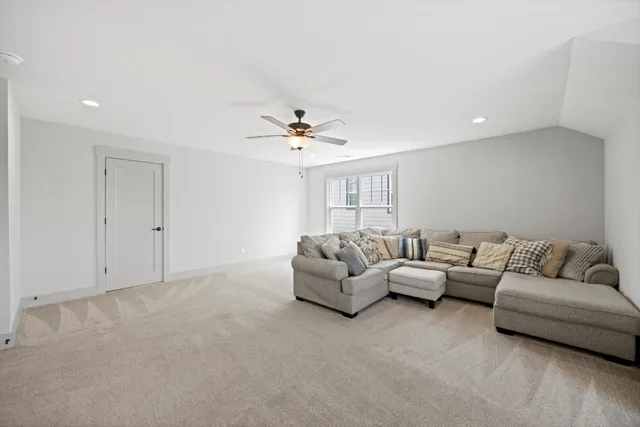 a living room with furniture and a couch