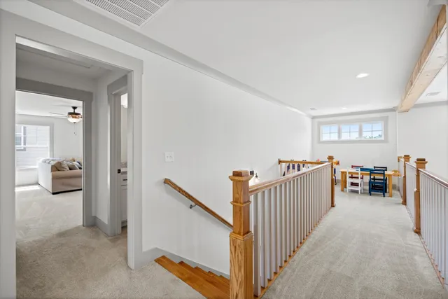 a view of a livingroom with furniture and windows