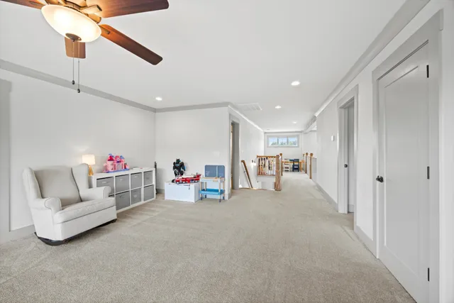 a view of livingroom with furniture and white walls