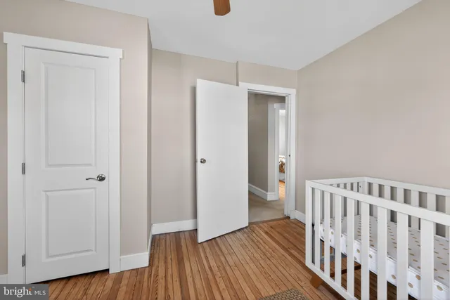 a bathroom with a sink mirror and vanity