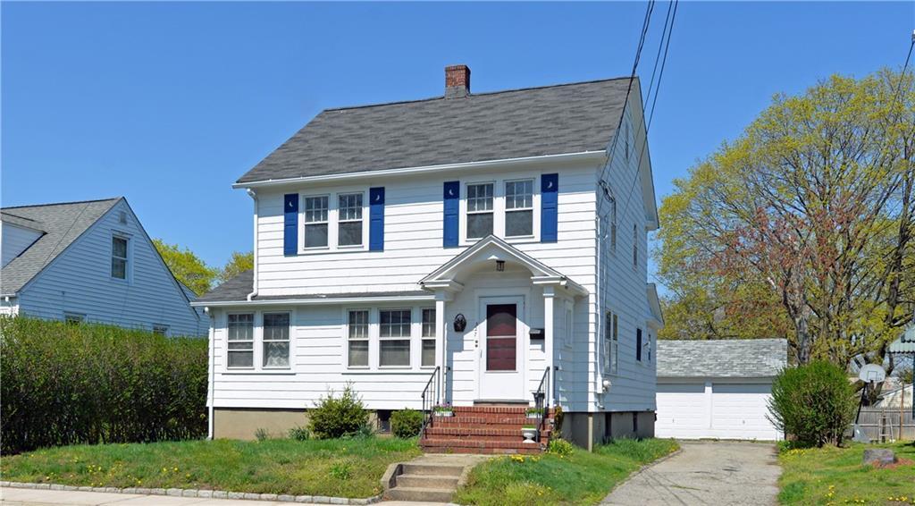 527 Reef Road Fairfield, CT 06824 - Photo 1 of 1 a front view of a house with a yard