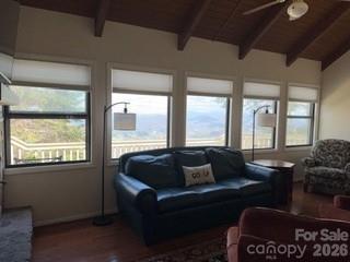 19 Lookout Loop Burnsville, NC 28714 - Photo 12 of 30 a living room with furniture and a large window