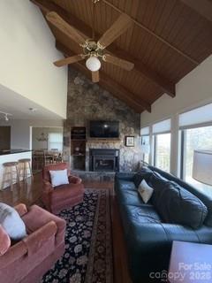 19 Lookout Loop Burnsville, NC 28714 - Photo 13 of 30 a living room with furniture and a fireplace